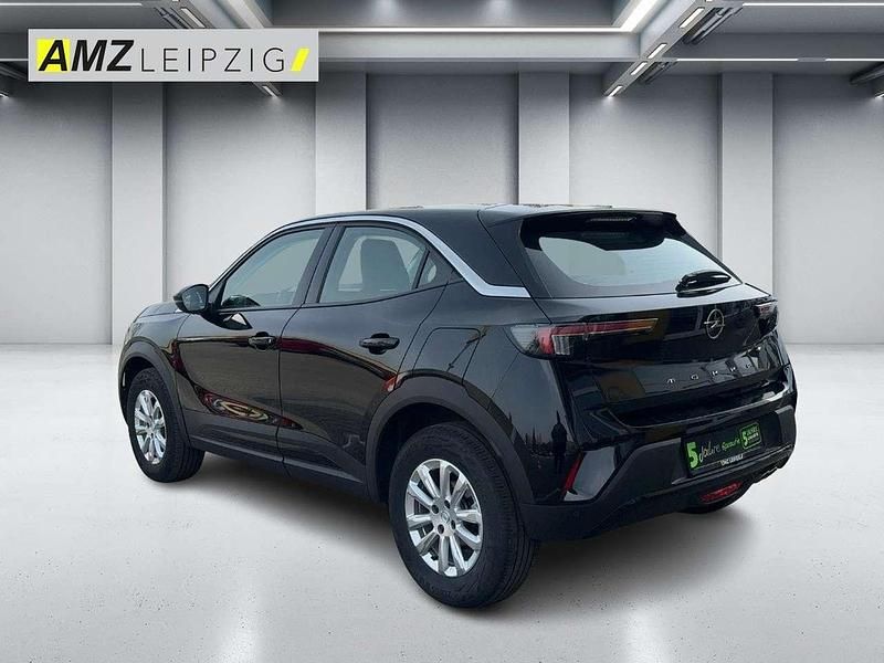 Gebraucht Opel Mokka Enjoy 131 PS (96 kW) 2023 Lackierung schwarz perla nera/ SUV