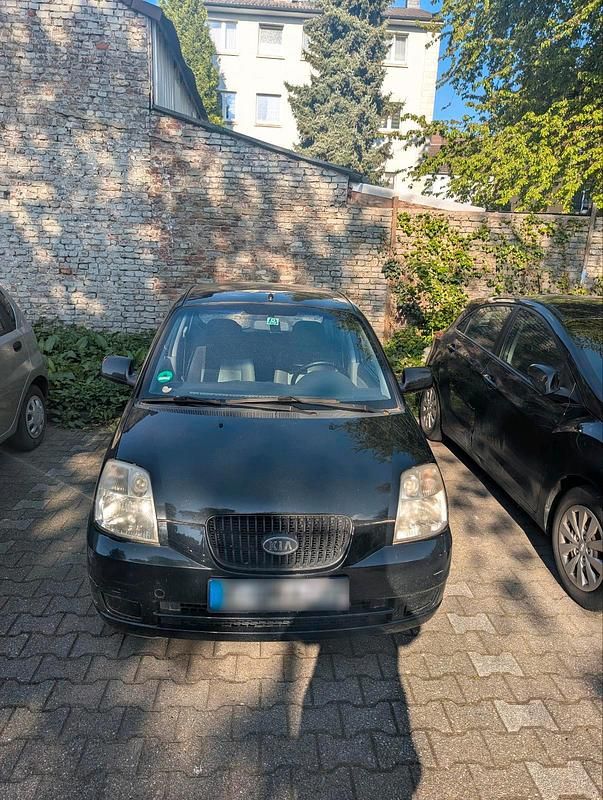 Second-hand Kia Picanto 65 CP (47 kW) 2005 Negru Hatchback