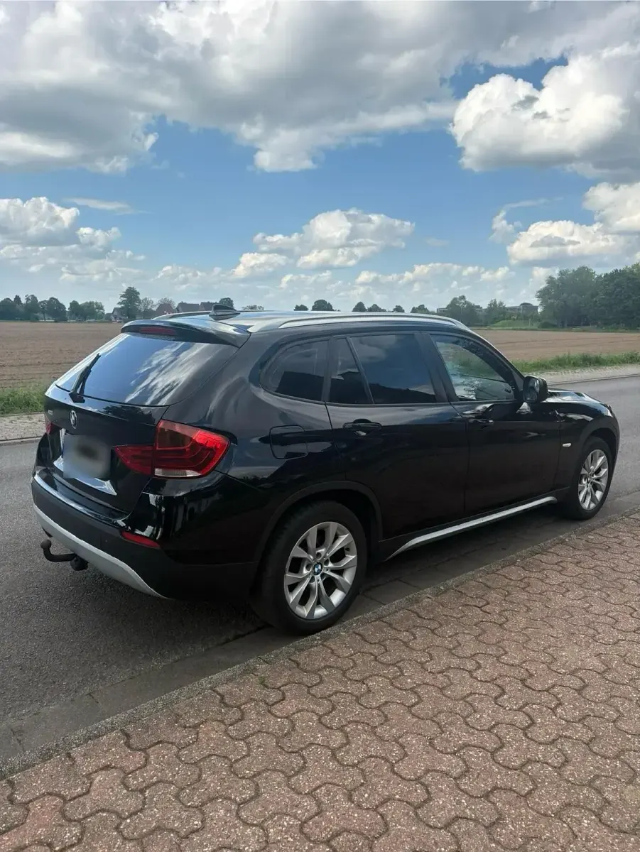 Second-hand BMW X1 184 CP (135 kW) 2012 Negru SUV