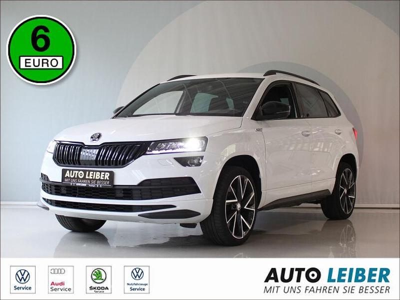 Weiss Gebraucht 2019 Skoda Karoq SportLine SUV | 25.990 € (Teuer) - Bild 1/4
