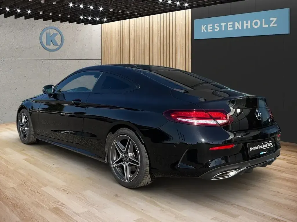 Gebraucht Mercedes C200 AMG 184 PS (135 kW) 2021 Lack obsidianschwarz Coupé