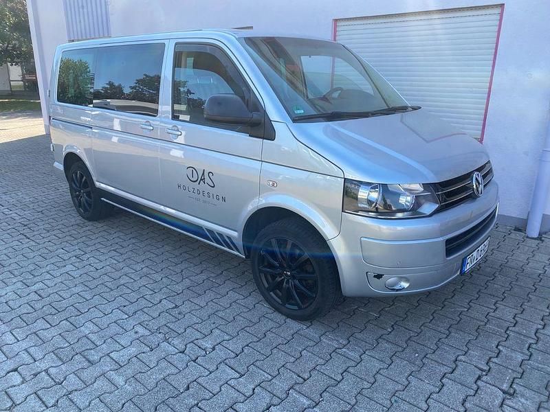 Silber Gebraucht 2015 VW Caravelle Van / Kleinbus | 18.800 € (Fairer Preis) - Bild 1/4