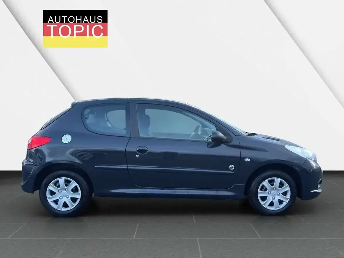 Używany Peugeot 206 60 KM (44 kW) 2012 Szary Hatchback