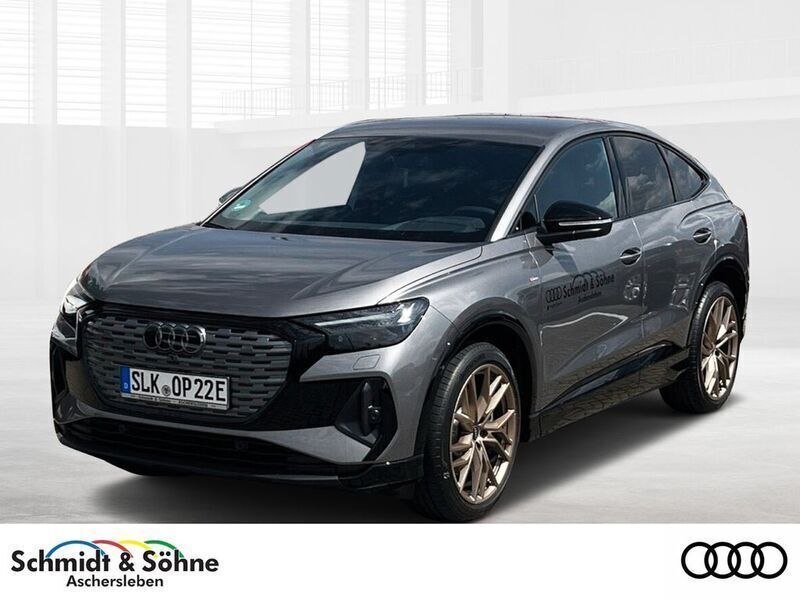 Grau metallic Gebraucht 2024 Audi Q4 Sportback e-tron S-Line SUV | 54.970 € (Teuer) - Bild 1/4