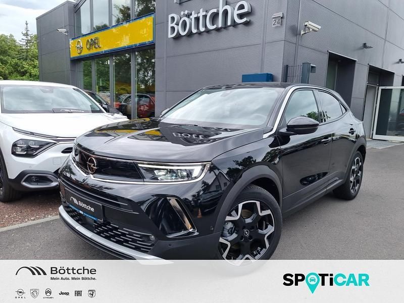 Diamant schwarz/karbon schwarz Gebraucht 2021 Opel Mokka-e Ultimate SUV | 17.980 € (Fairer Preis) - Bild 1/4