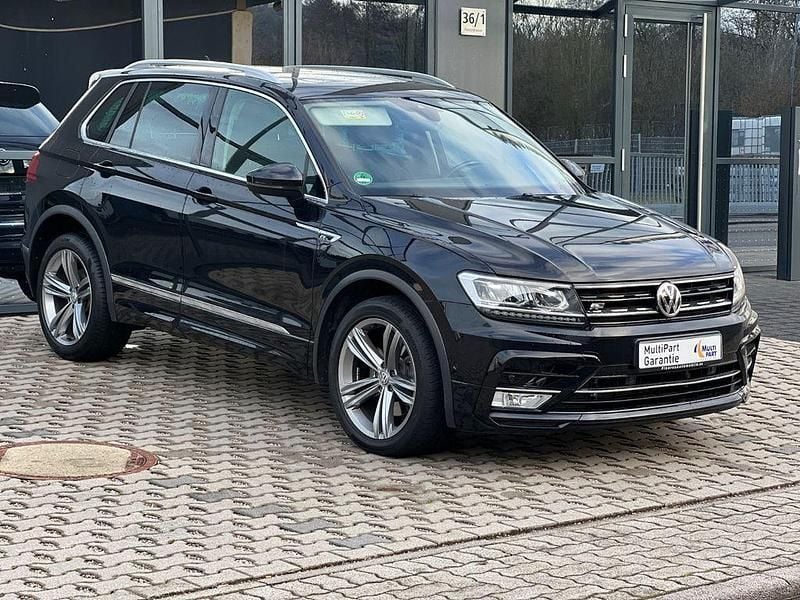 Schwarz Gebraucht 2017 VW Tiguan Highline SUV | 25.399 € (Superpreis) - Bild 1/4