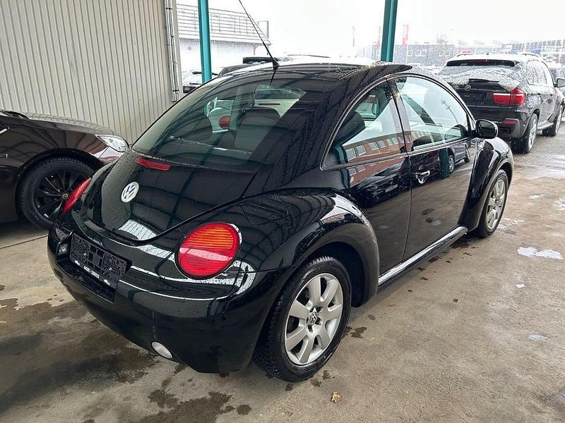 Gebraucht VW New Beetle 75 PS (55 kW) 2003 Schwarz Kleinwagen