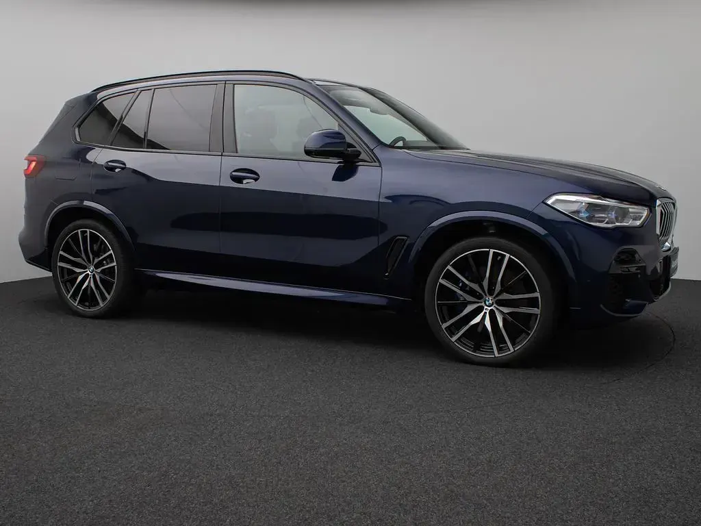 Gebraucht BMW X5 M Sport 340 PS (250 kW) 2022 Bmw individual tansanitblauc3 SUV