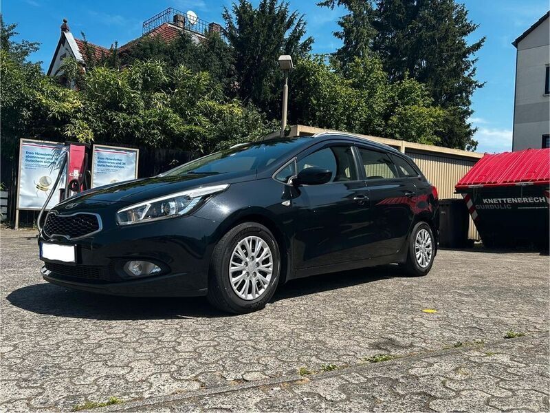 Schwarz Gebraucht 2014 Kia Ceed Sportswagon Vision Kombi | 4.900 € (Fairer Preis) - Bild 1/4
