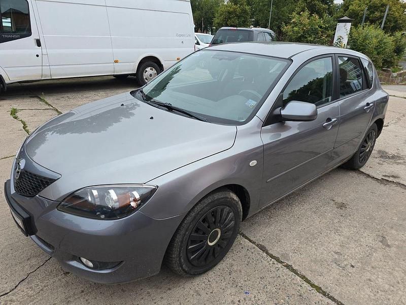 Grau Gebraucht 2006 Mazda 3 Active Limousine | 690 € (Superpreis) - Bild 1/4