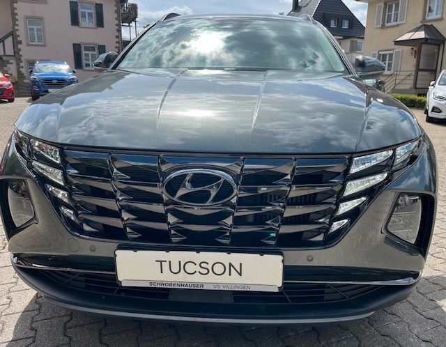 Amazon grey / met Gebraucht 2021 Hyundai Tucson Trend SUV | 25.890 € (Fairer Preis) - Bild 1/4