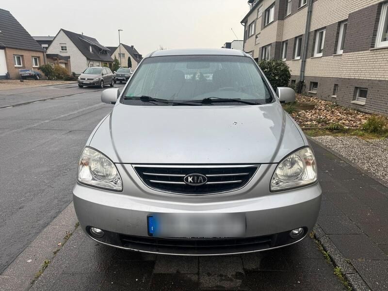 Silber Gebraucht 2006 Kia Carens 4 Van / Kleinbus | 900 € - Bild 1/4