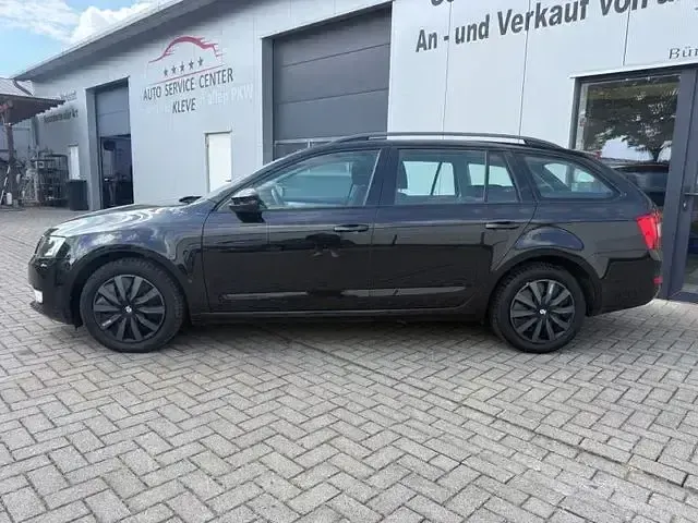 Gebraucht Skoda Octavia Ambition 105 PS (77 kW) 2014 Cerna magic/black magic Kombi