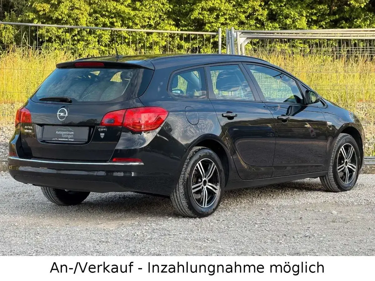 Gebraucht Opel Astra 110 PS (80 kW) 2013 Graphitschwarz/carbon flash/mi Kombi