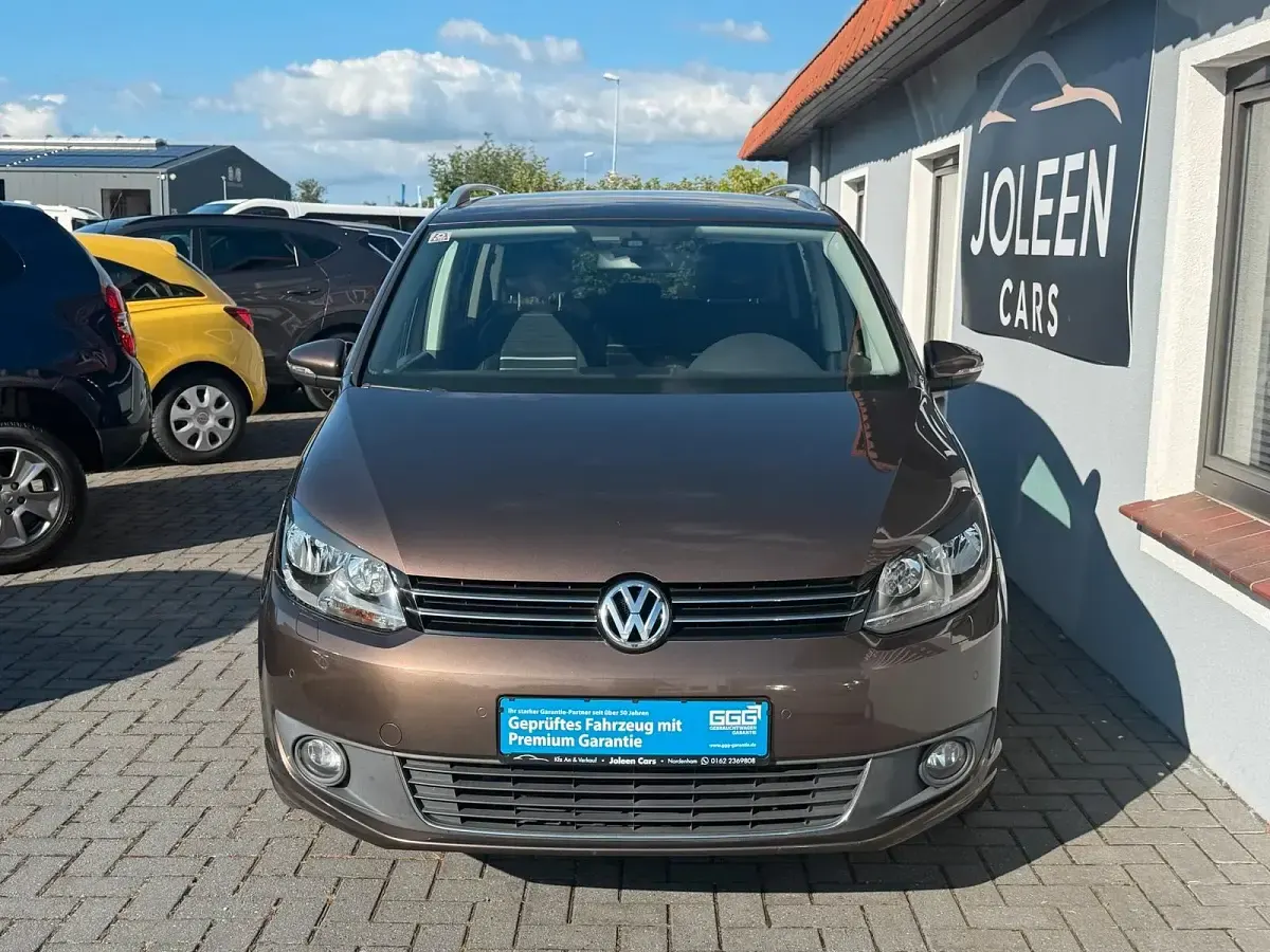 Gebraucht VW Touran Edition 105 PS (77 kW) 2014 Braun Van / Kleinbus