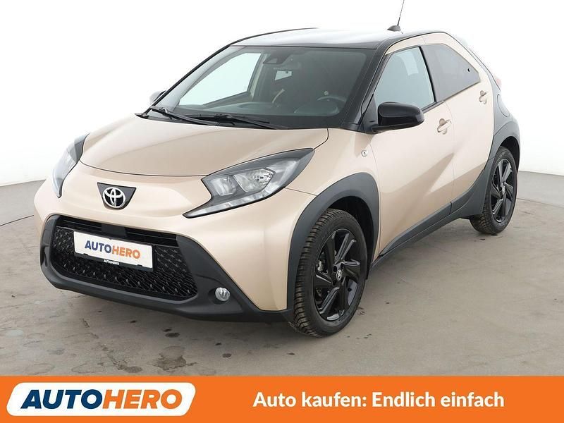 Braun Gebraucht 2024 Toyota Aygo X Team SUV | 17.210 € (Fairer Preis) - Bild 1/3