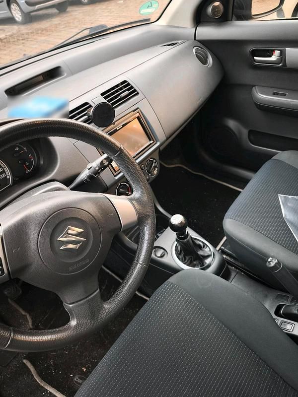 Gebraucht Suzuki Swift 94 PS (69 kW) 2010 Schwarz Kleinwagen