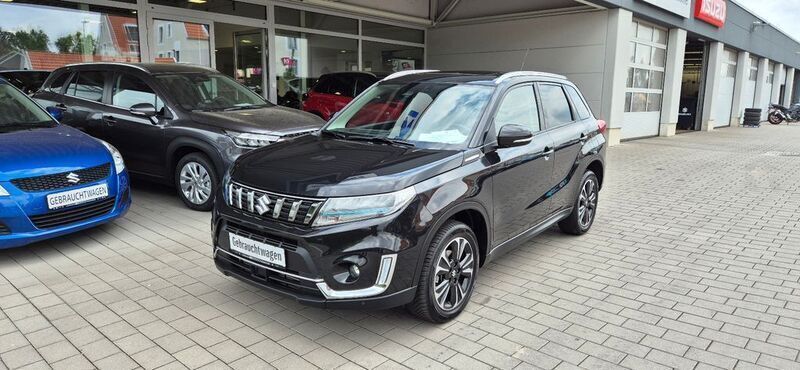 Schwarz Gebraucht 2023 Suzuki Vitara Comfort+ SUV | 22.990 € (Etwas zu teuer) - Bild 1/4