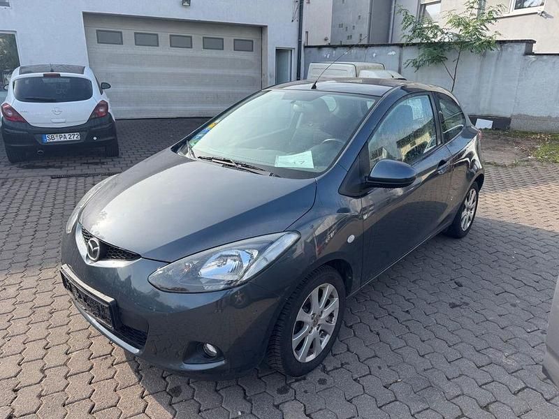 Grau Gebraucht 2009 Mazda 2 Impuls Limousine | 1.999 € (Superpreis) - Bild 1/4