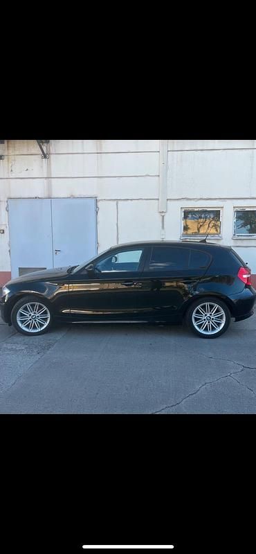 Gebraucht BMW 116 122 PS (89 kW) 2010 Schwarz Kleinwagen