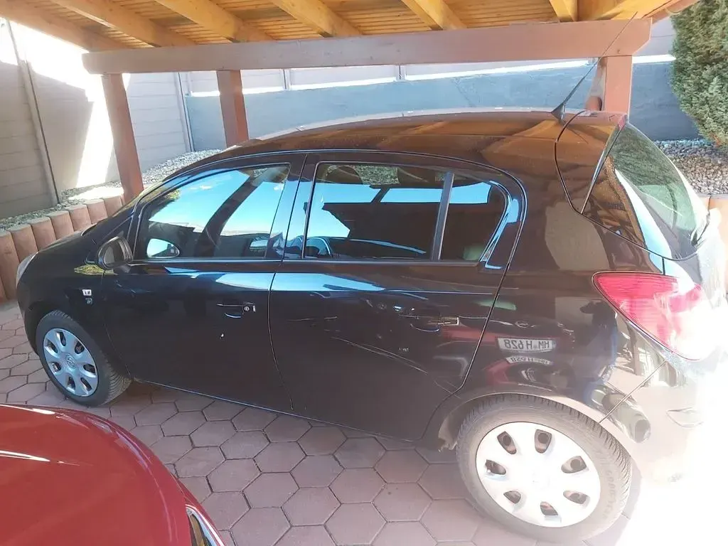 Używany Opel Corsa Selection 87 KM (63 kW) 2010 Czarny Hatchback