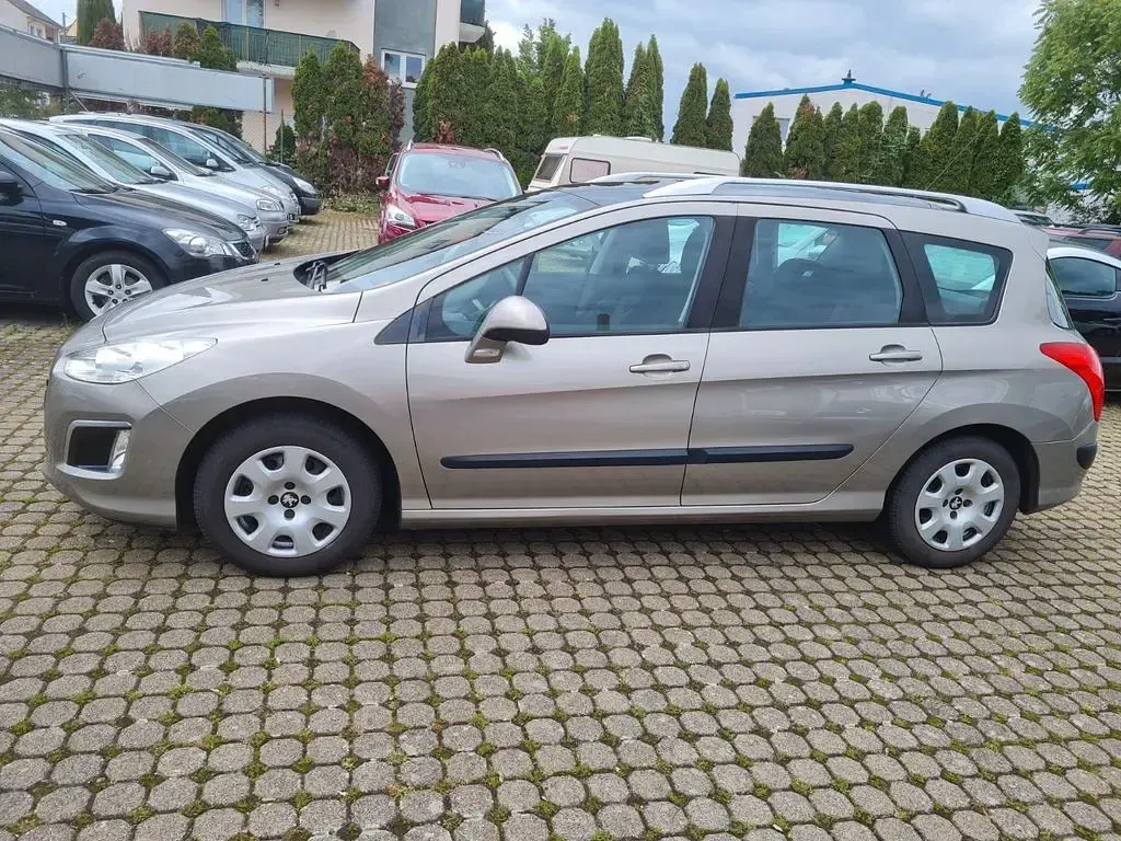 Gebraucht Peugeot 308 SW Access 98 PS (72 kW) 2011 Gold Kombi
