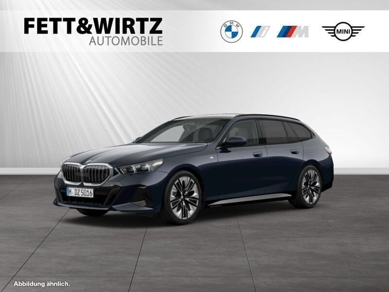 Carbonschwarz metallic Gebraucht 2024 BMW 520 M Sport Kombi | 53.499 € (Superpreis) - Bild 1/3