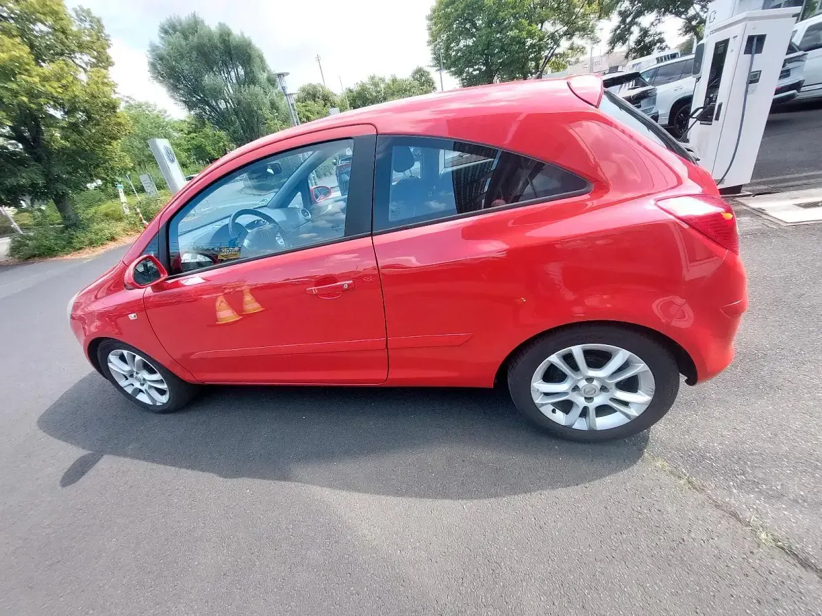 Gebraucht Opel Corsa 80 PS (58 kW) 2007 Rot Kleinwagen