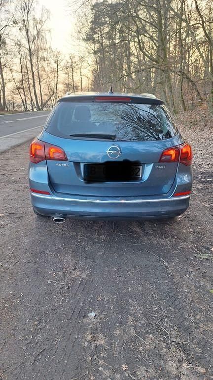 Gebraucht Opel Astra Edition 165 PS (121 kW) 2014 Blau Kombi
