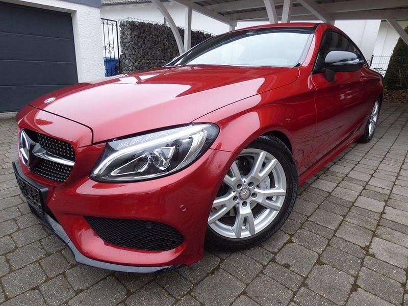 Hyazinth rot metallic Gebraucht 2018 Mercedes C180 AMG Coupé | 24.890 € (Guter Preis) - Bild 1/4