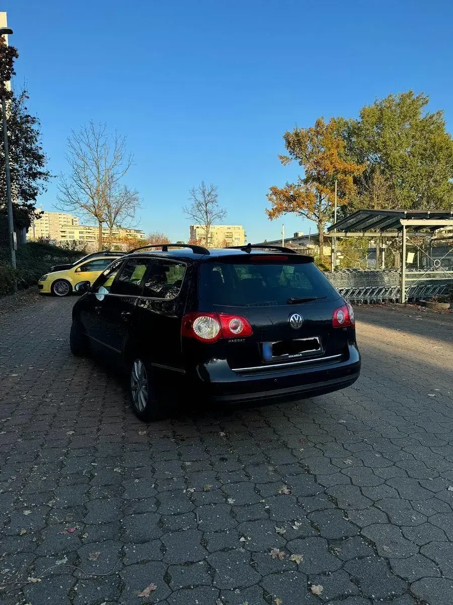 Second-hand VW Passat 122 CP (89 kW) 2010 Negru Berlinǎ