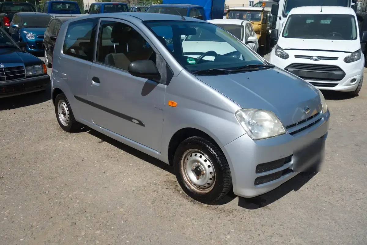 Gebraucht Daihatsu Cuore 58 PS (42 kW) 2006 Silber Kleinwagen
