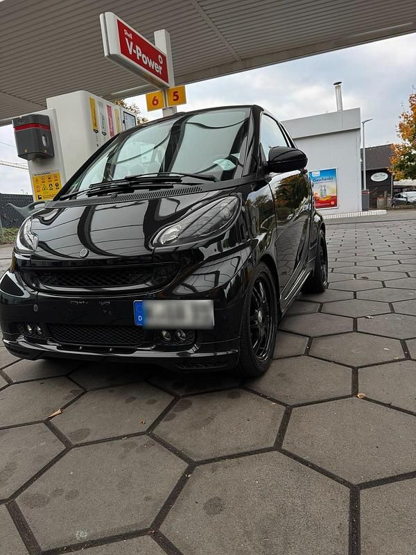 Schwarz Gebraucht 2010 Smart ForTwo Cabrio Brabus Cabrio | 7.499 € - Bild 1/4