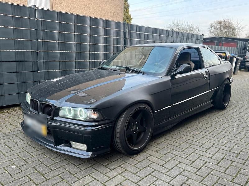 Schwarz Gebraucht 1992 BMW 325 Coupé | 9.500 € - Bild 1/4