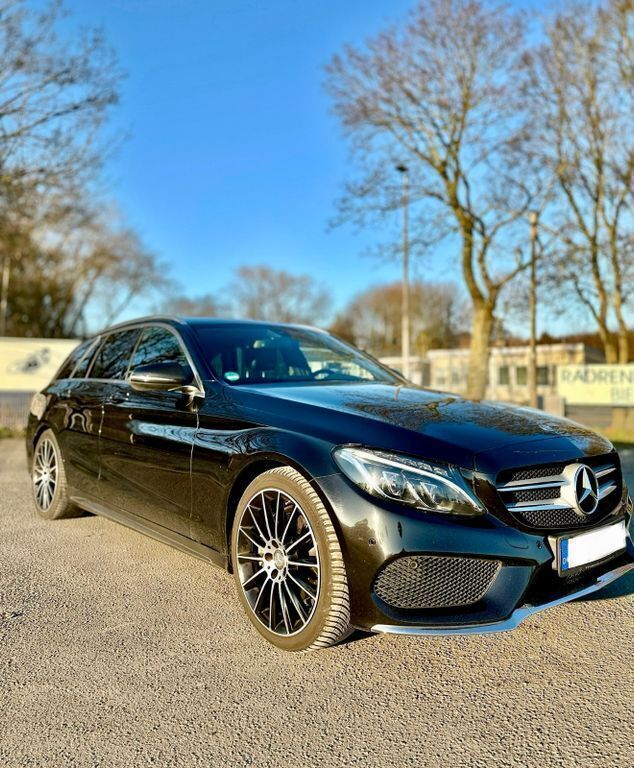 Schwarz Gebraucht 2015 Mercedes C180 AMG Kombi | 18.700 € (Teuer) - Bild 1/4