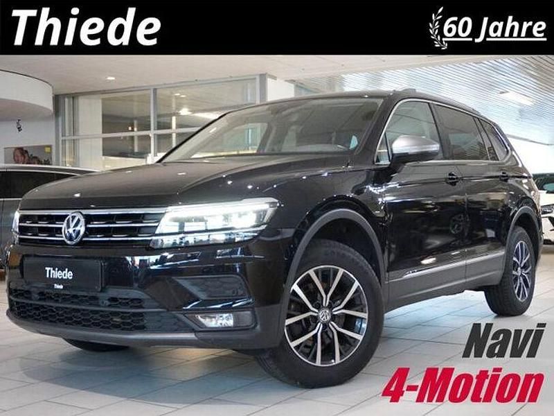 Deep black metallic Gebraucht 2020 VW Tiguan Allspace Sport SUV | 24.950 € (Superpreis) - Bild 1/3