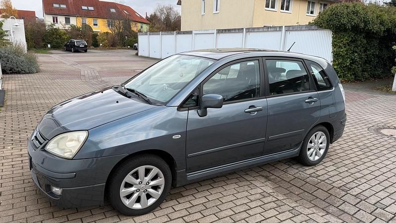 Grau Gebraucht 2007 Suzuki Liana Limousine | 3.899 € (Etwas zu teuer) - Bild 1/4