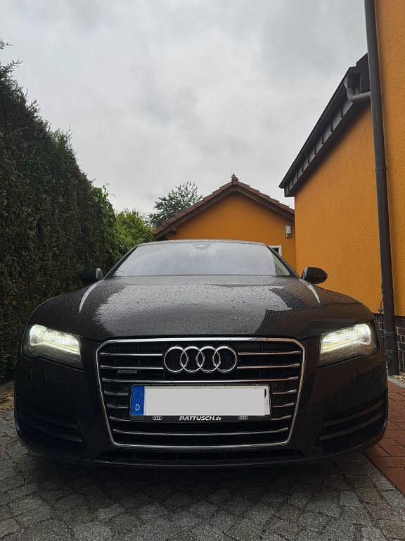 Schwarz Gebraucht 2014 Audi A7 Sportback Ambiente Kleinwagen | 20.500 € (Fairer Preis) - Bild 1/4