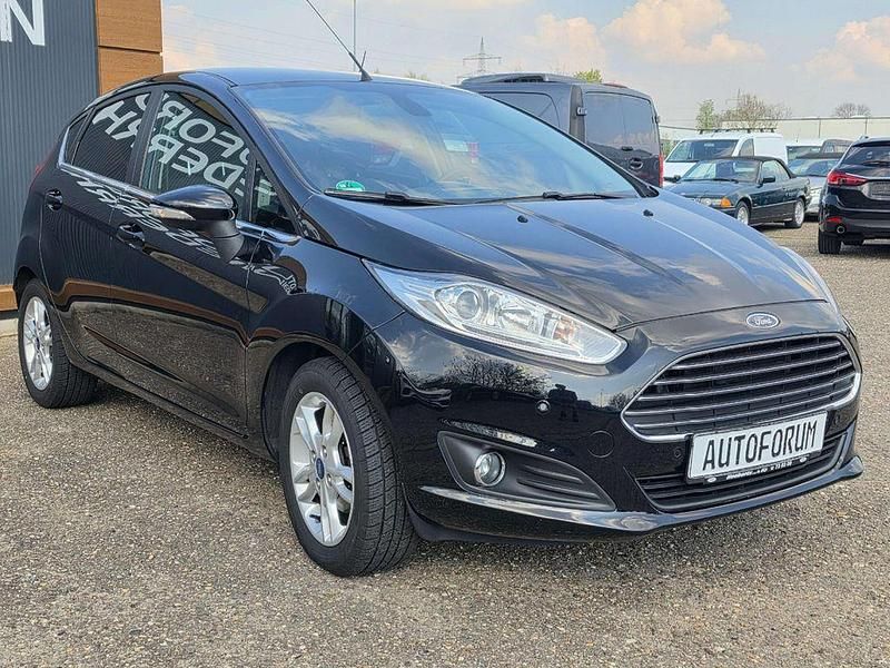 Gebraucht Ford Fiesta Titanium 125 PS (91 kW) 2017 Iridiumschwarz metallic Limousine