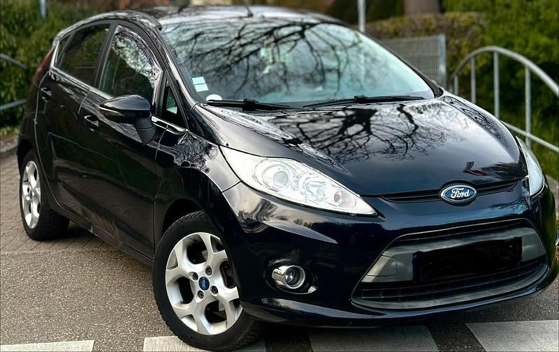 Gebraucht Ford Fiesta 71 PS (52 kW) 2011 Schwarz Kleinwagen
