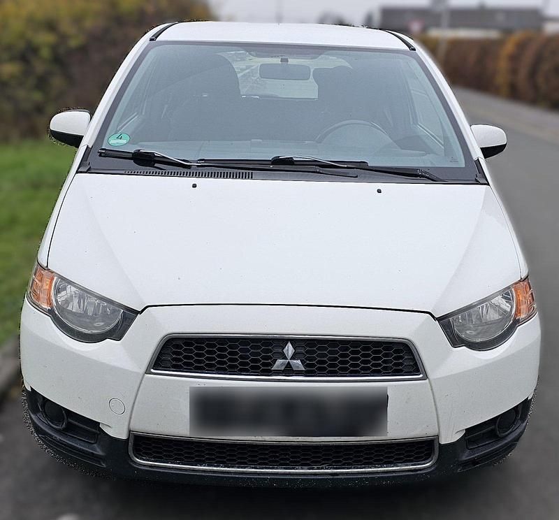 Gebraucht Mitsubishi Colt 95 PS (69 kW) 2011 Weiß Kleinwagen