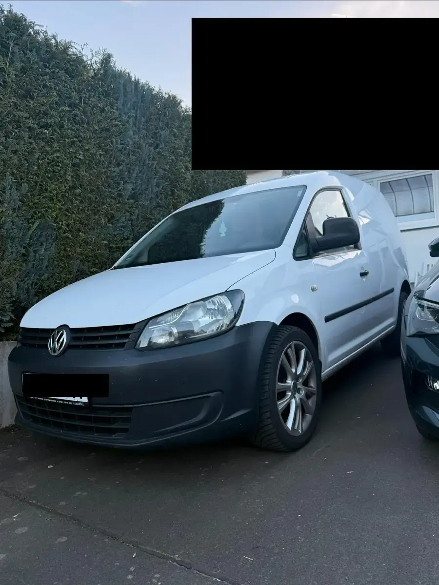 Używany VW Caddy 109 KM (80 kW) 2013 Biały Minivan