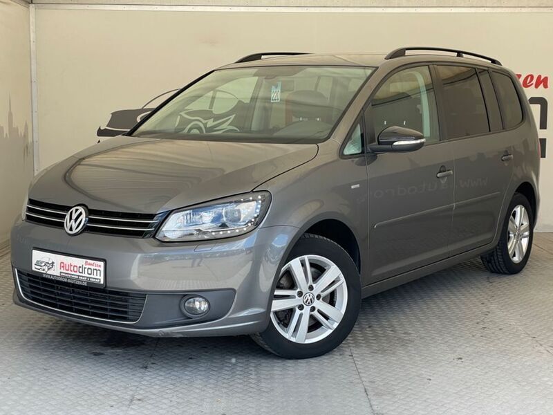 Grau Gebraucht 2012 VW Touran Match Van / Kleinbus | 10.499 € (Teuer) - Bild 1/4