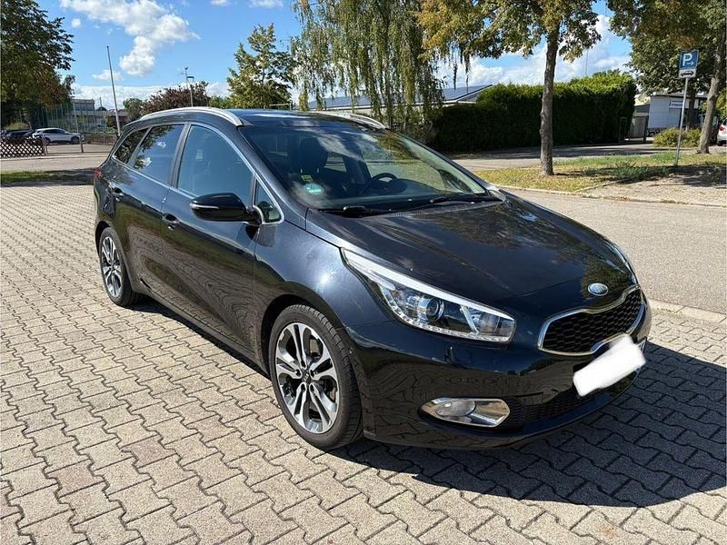 Schwarz Gebraucht 2013 Kia Ceed Sportswagon Spirit Kombi | 9.700 € (Fairer Preis) - Bild 1/4