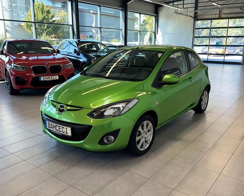 Grün Gebraucht 2013 Mazda 2 Edition Kleinwagen | 6.900 € (Fairer Preis) - Bild 1/4