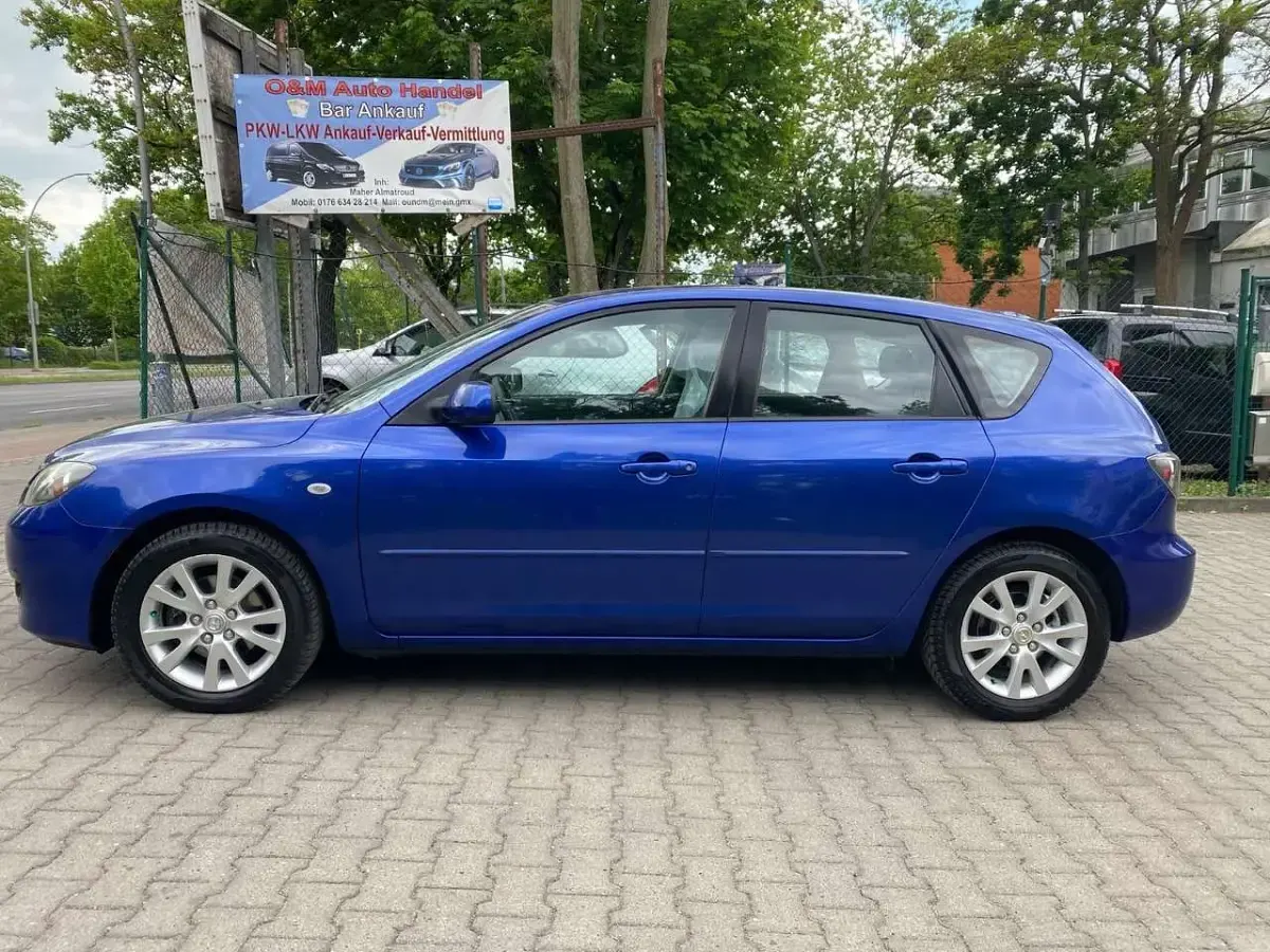 Używany Mazda 3 Active Plus 105 KM (77 kW) 2009 Niebieski Sedan/Limuzyna