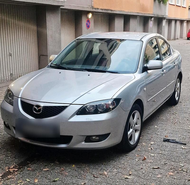 Second-hand Mazda 3 77 CP (56 kW) 2004 Argintiu Berlinǎ