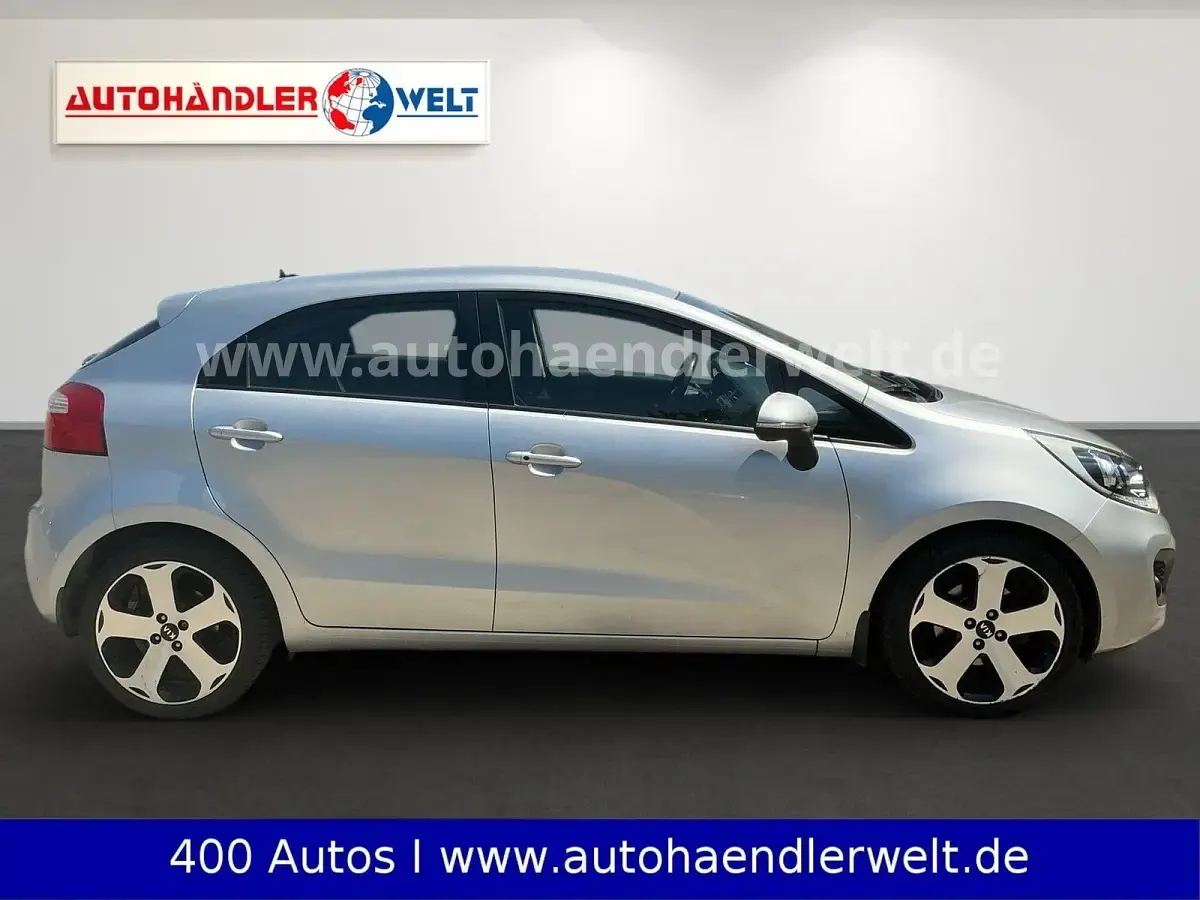 Gebraucht Kia Rio 90 PS (66 kW) 2013 Silber Kleinwagen