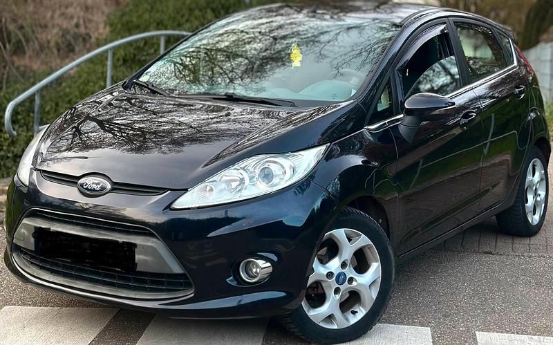 Gebraucht Ford Fiesta 71 PS (52 kW) 2011 Schwarz Kleinwagen