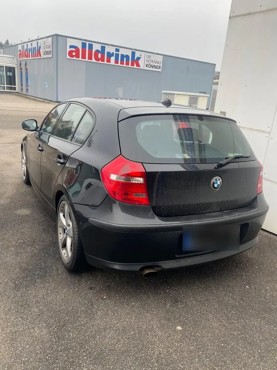 Second-hand BMW 116 122 CP (89 kW) 2010 Negru Hatchback